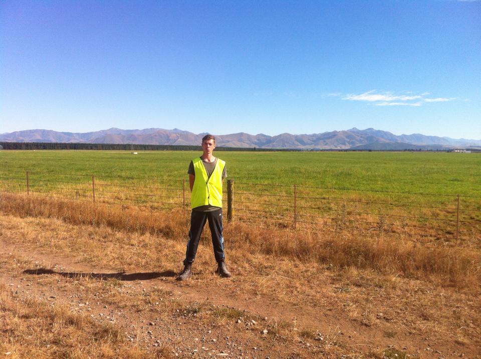 me standing in a field in New Zealand