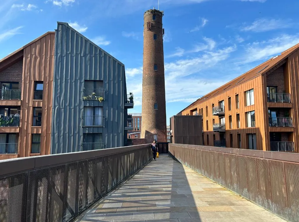 Chester Shot Tower flanked by apartment buildings either side