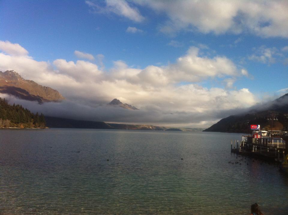 View of Lake Wakatipu with clouds below the mountains