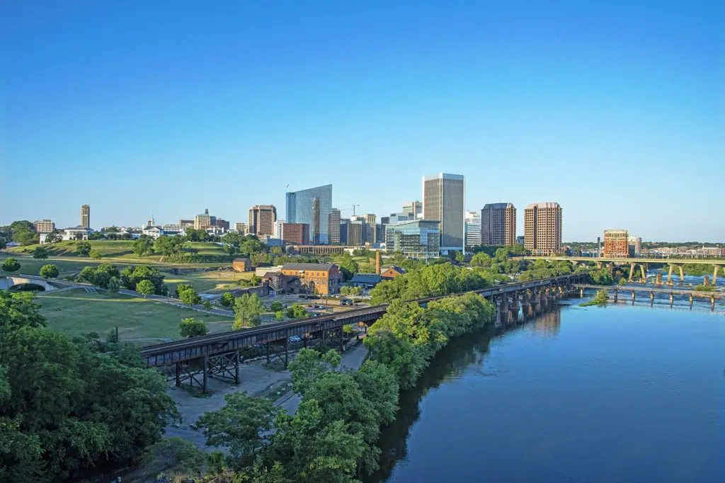 skyline of Richmond in the background with a river visible in the foreground