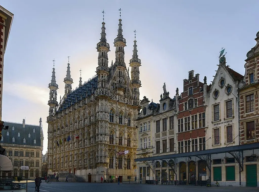 Exterior of Leuven Town Hall, with three spires at the front and three at the rear