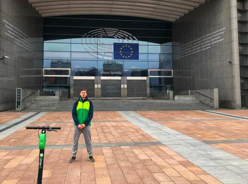 me in front of the EU parliament building in Brussels
