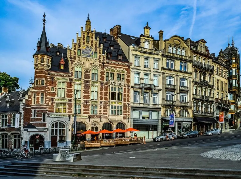 a street in Brussels with ornate buildings in the background