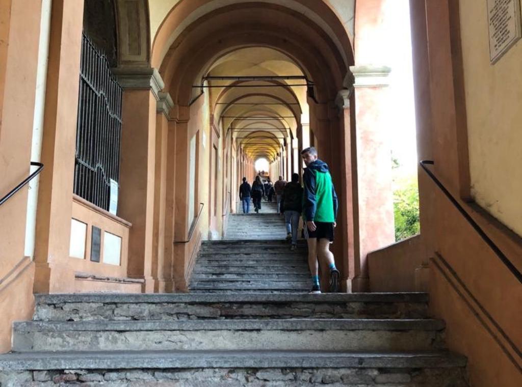 me walking under the portico to get to the Sanctuary di San Luca