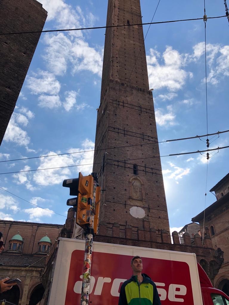 me in front of one of the two towers in Bologna