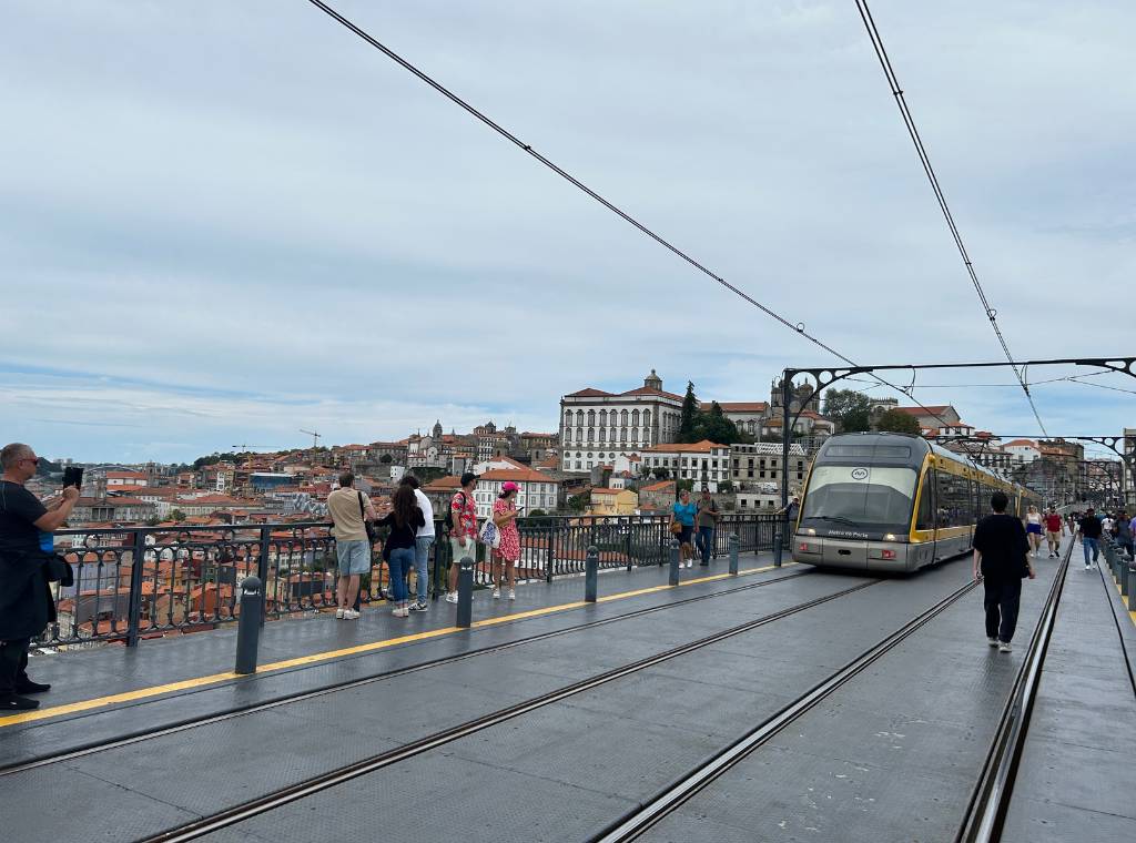 tram in porto crossing the bridge