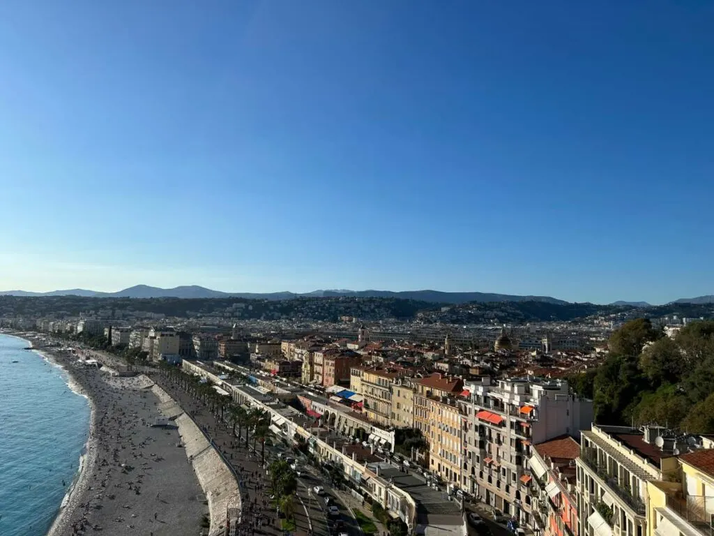 overhead view of promenade des anglais with the told town to the right