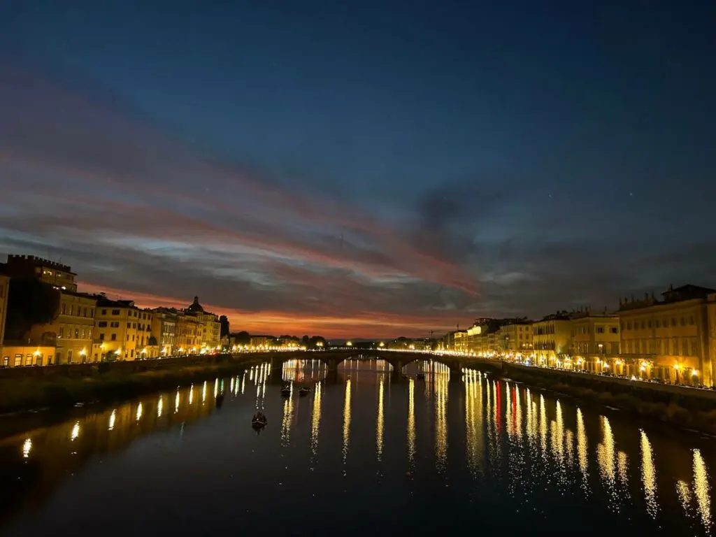 river in florence at night
