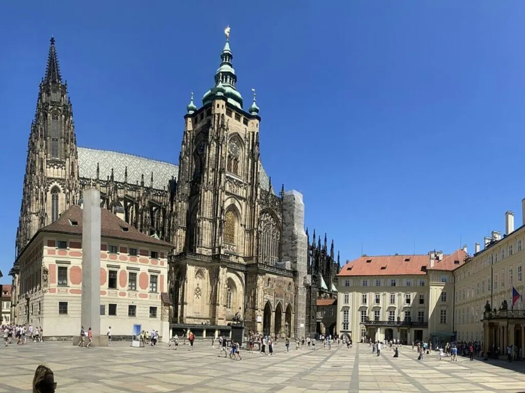 in the grounds of Prague Castle with St Vitus Cathedral in the background of the square