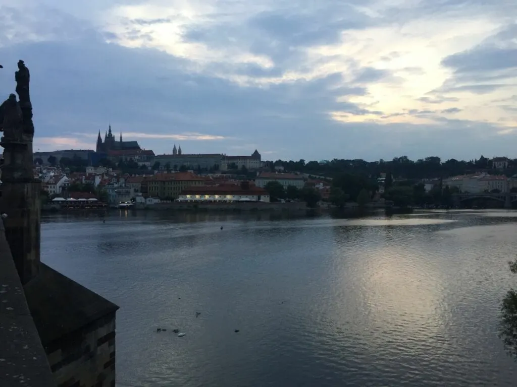 view across the Vltava River with Prague Castle visible in the background